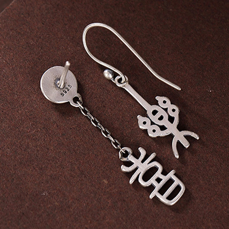 Pendientes de protección con caracteres chinos "Ping An" y "Xi Le" en plata de ley 925 con Buddha Stones
