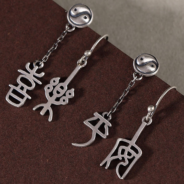 Pendientes de protección con caracteres chinos "Ping An" y "Xi Le" en plata de ley 925 con Buddha Stones