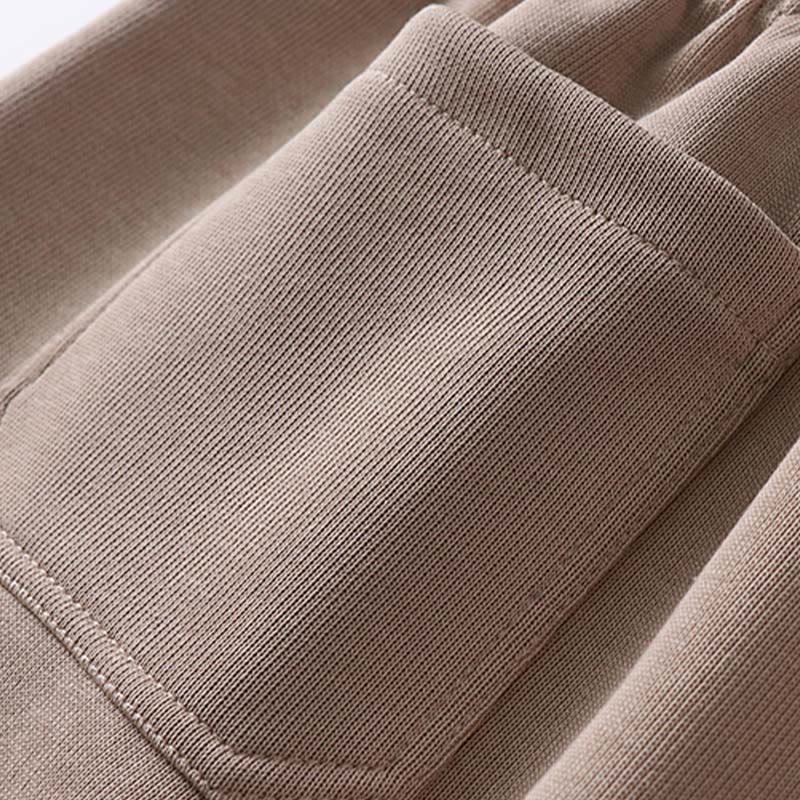 Pantalones de hombre con bolsillos y tejido polar de algodón de color liso con Buddha Stones