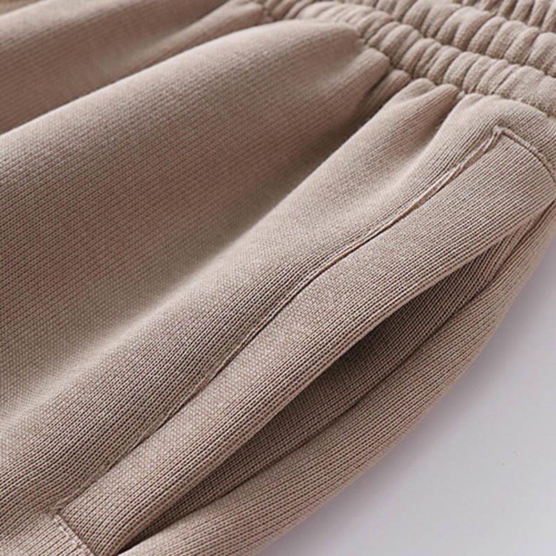 Pantalones de hombre con bolsillos y tejido polar de algodón de color liso con Buddha Stones