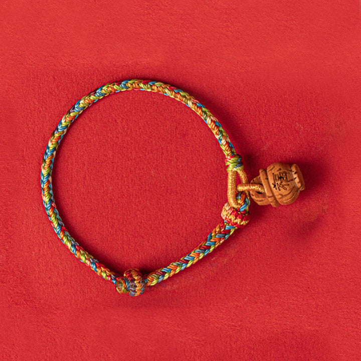 Pulsera de madera de melocotón con Buddha Stones y carácter Fu para la seguridad y la prosperidad