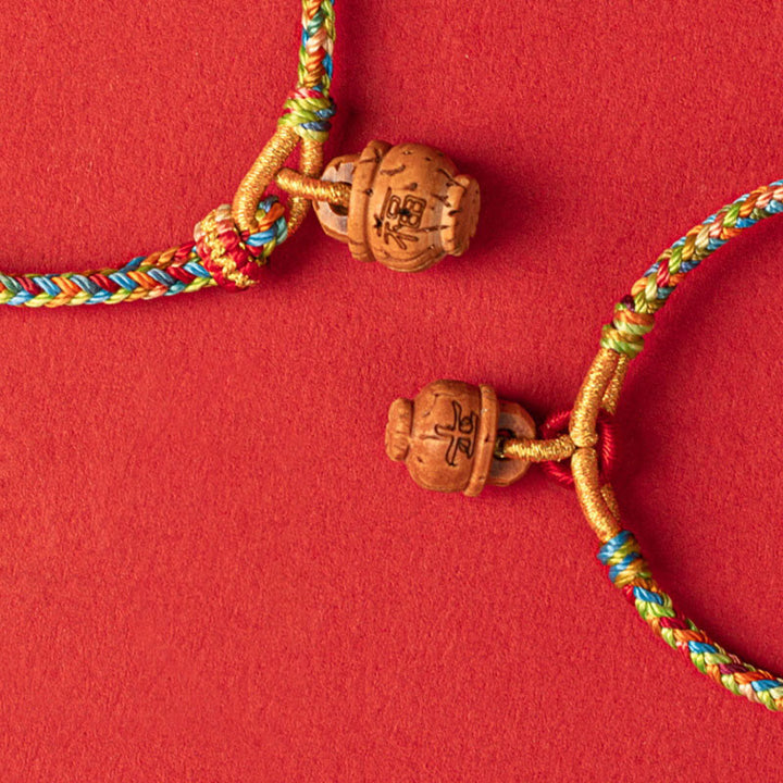 Pulsera de madera de melocotón con Buddha Stones y carácter Fu para la seguridad y la prosperidad