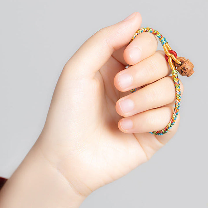 Pulsera de madera de melocotón con Buddha Stones y carácter Fu para la seguridad y la prosperidad