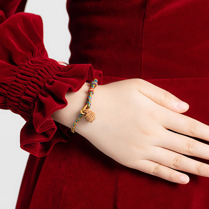 Pulsera de madera de melocotón con Buddha Stones y carácter Fu para la seguridad y la prosperidad