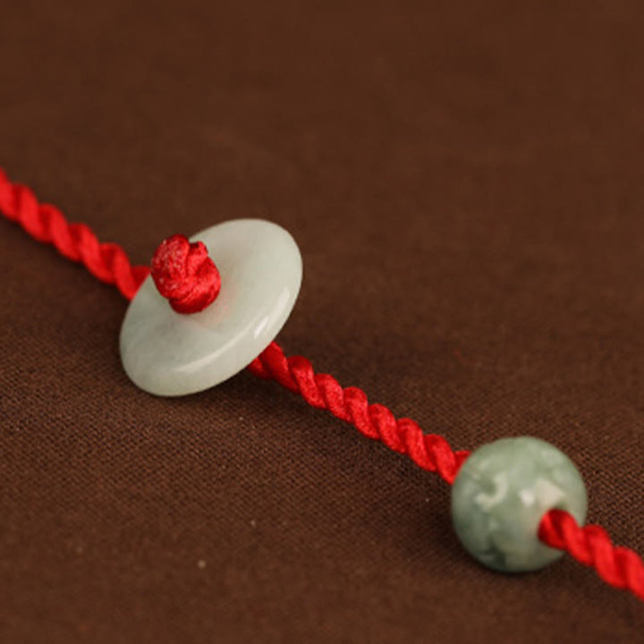 Cadena para el vientre con hilo rojo y hebilla de paz de Buddha Stones