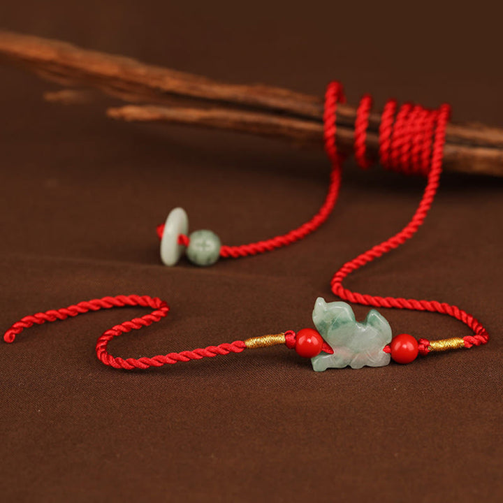 Cadena para el vientre con hilo rojo y hebilla de paz de Buddha Stones