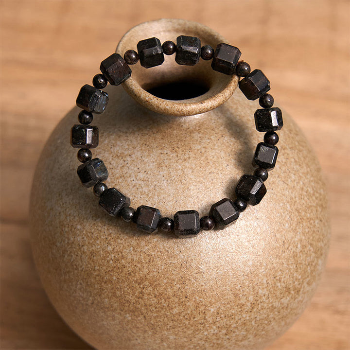 Pulsera de transformación de astrofilita con Buddha Stones