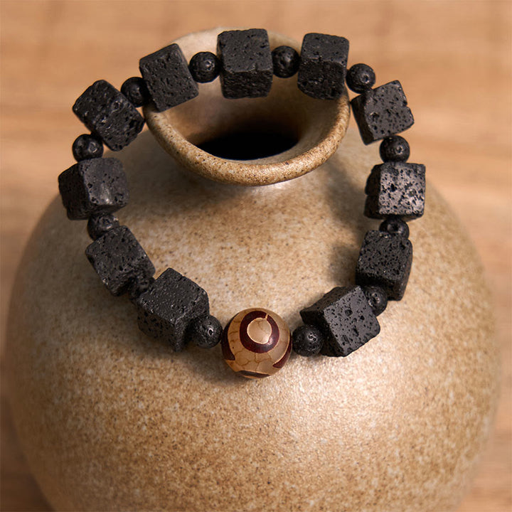 Pulsera curativa con cuentas Dzi de piedra de lava y Buddha Stones
