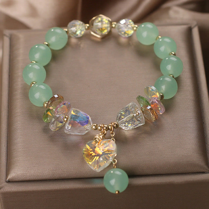 Pulsera curativa con dijes de corazón de amor y cristal verde aguamarina de Buddha Stones
