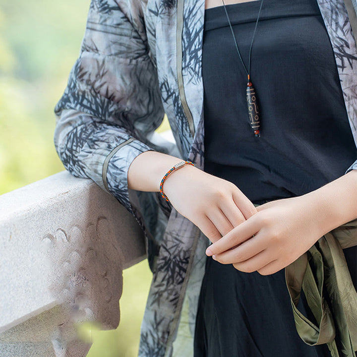 Pulsera de la suerte de plata de ley 925 con seis palabras verdaderas y hilo rojo y hilo negro de Buddha Stones - image 9
