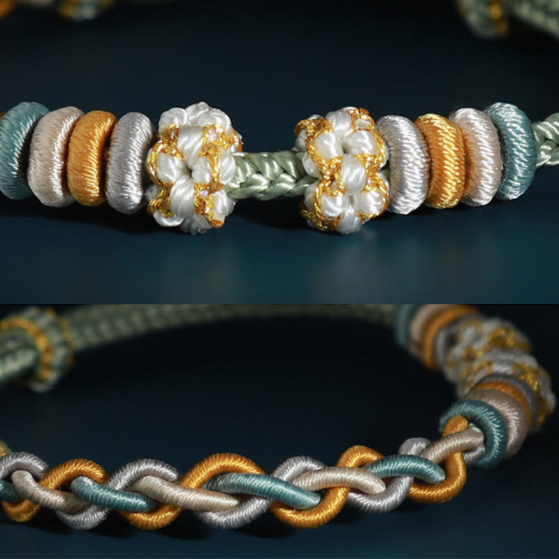 Pulsera de cuatro hilos con Buddha Stones y flor de durazno