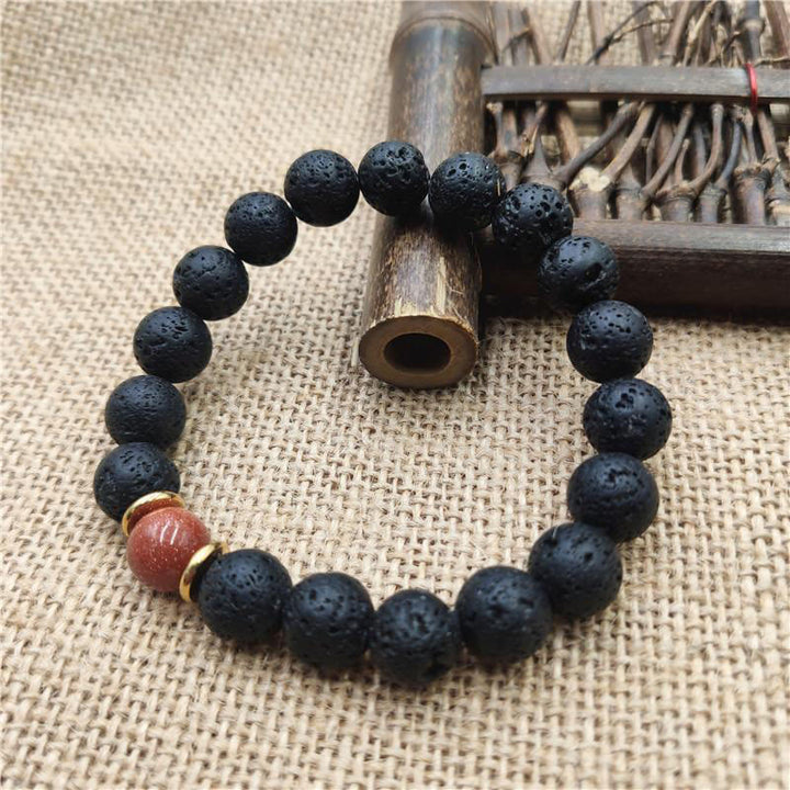 Pulsera curativa de piedra arenisca azul, piedra de lava y Buddha Stones