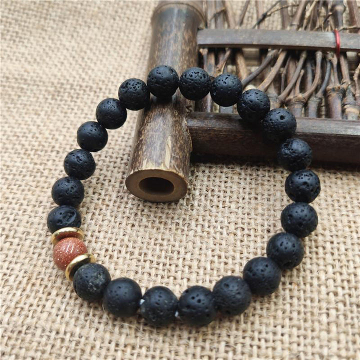 Pulsera curativa de piedra arenisca azul, piedra de lava y Buddha Stones