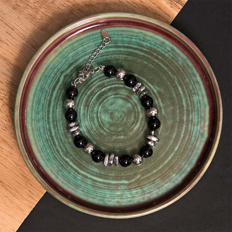 Pulsera de la suerte con Buddha Stones y ónix negro