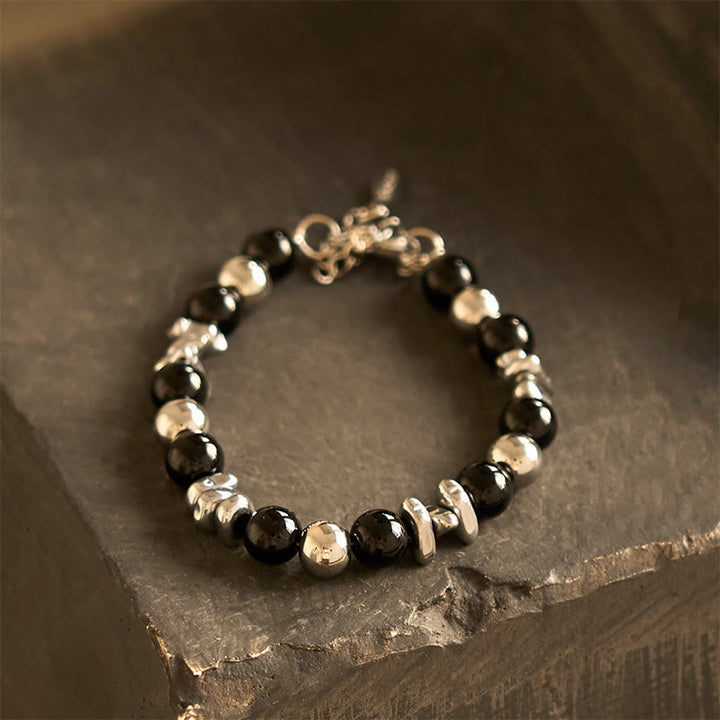 Pulsera de la suerte con Buddha Stones y ónix negro