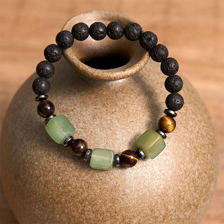 Pulsera de piedra de lava con cristales variados y Buddha Stones