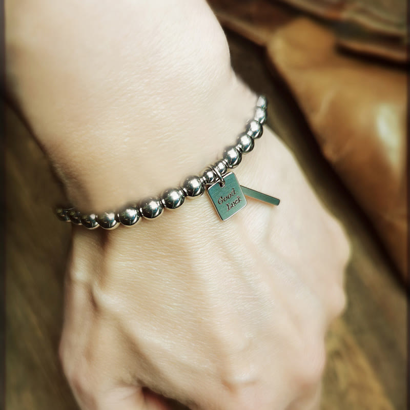 Pulsera de equilibrio de buena suerte de acero y titanio con Buddha Stones