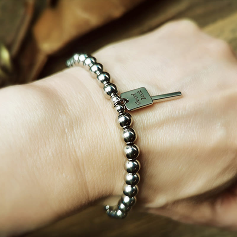 Pulsera de equilibrio de buena suerte de acero y titanio con Buddha Stones