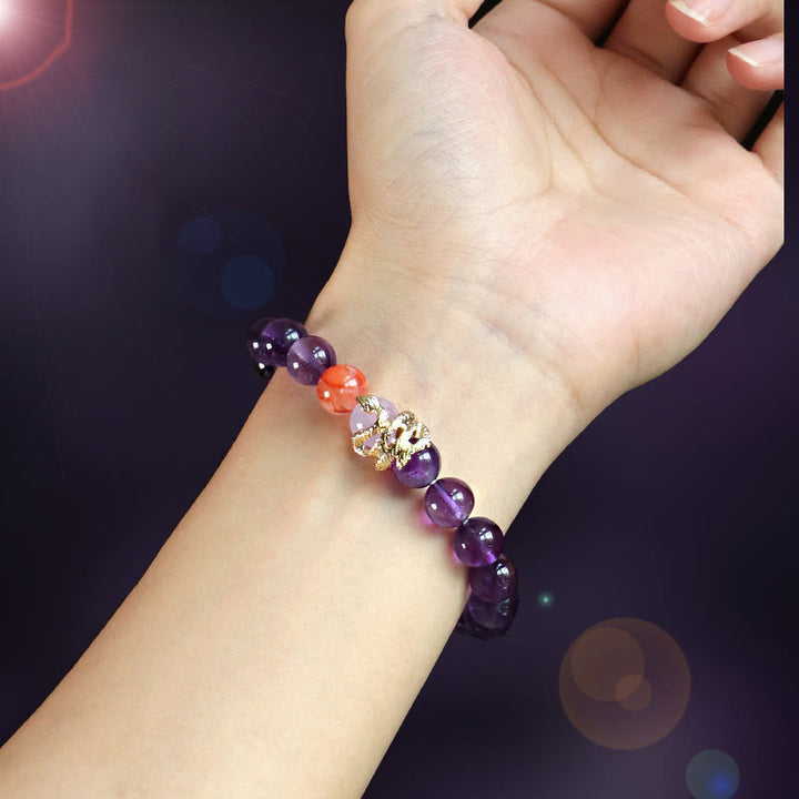 Pulsera de la suerte del año de la serpiente con Buddha Stones, varios cristales, cristal rosa y amatista