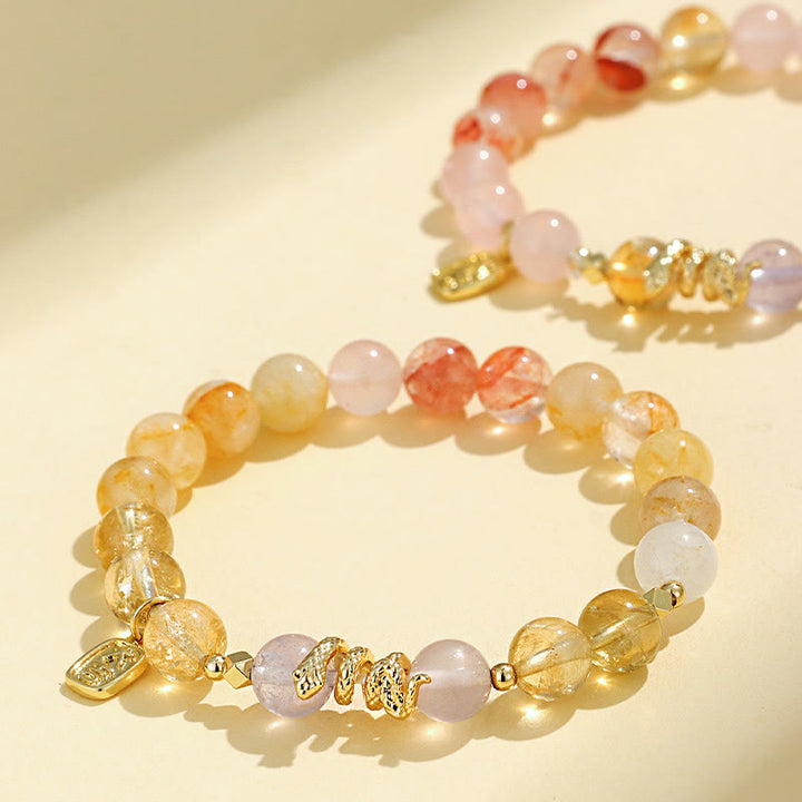 Pulsera de la suerte del año de la serpiente con Buddha Stones, varios cristales, cristal rosa y amatista