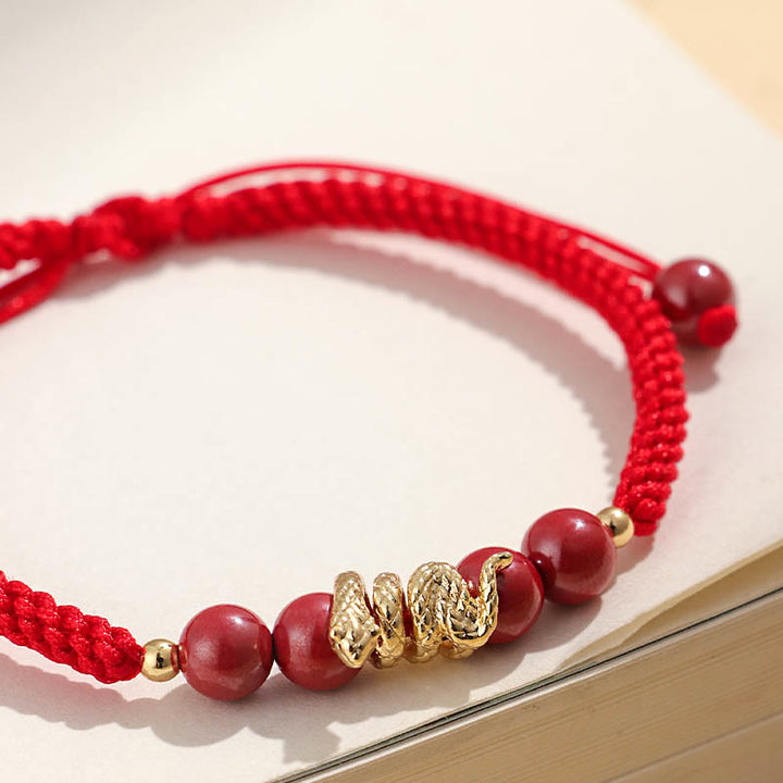 Pulsera trenzada de protección hecha a mano con Buddha Stones y cinabrio con hilo de serpiente