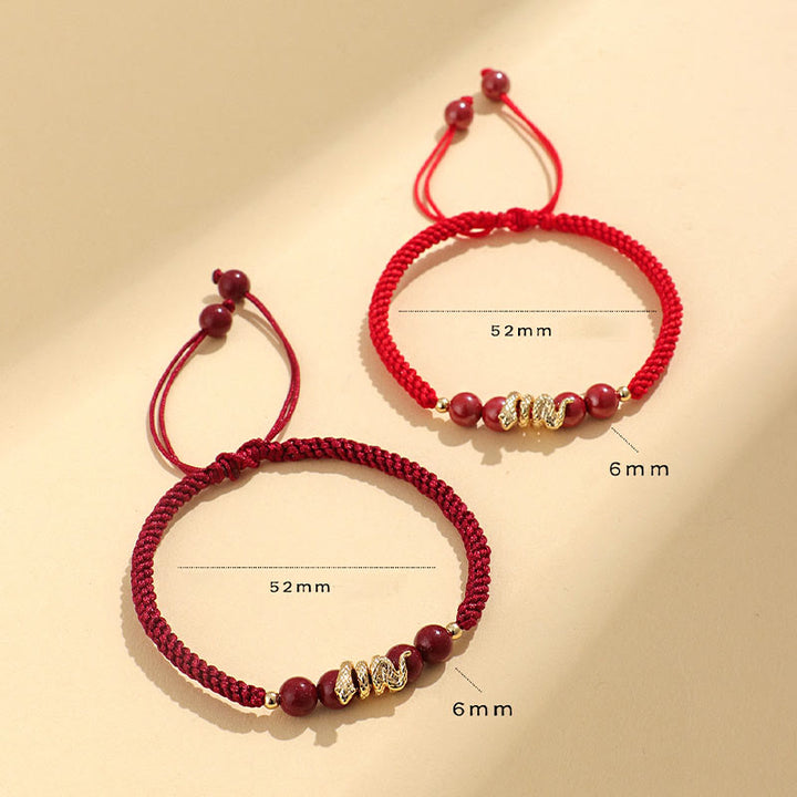 Pulsera trenzada de protección hecha a mano con Buddha Stones y cinabrio con hilo de serpiente