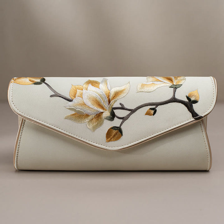 Bolso de mano con bordado de magnolia y Buddha Stones para bodas