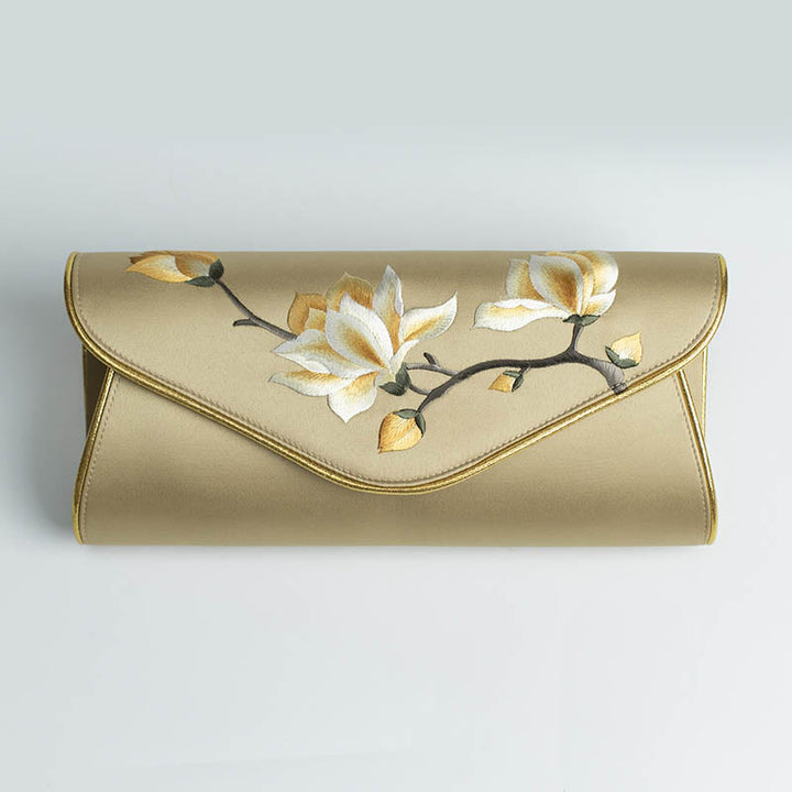 Bolso de mano con bordado de magnolia y Buddha Stones para bodas