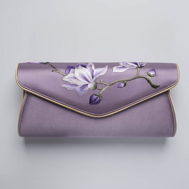 Bolso de mano con bordado de magnolia y Buddha Stones para bodas