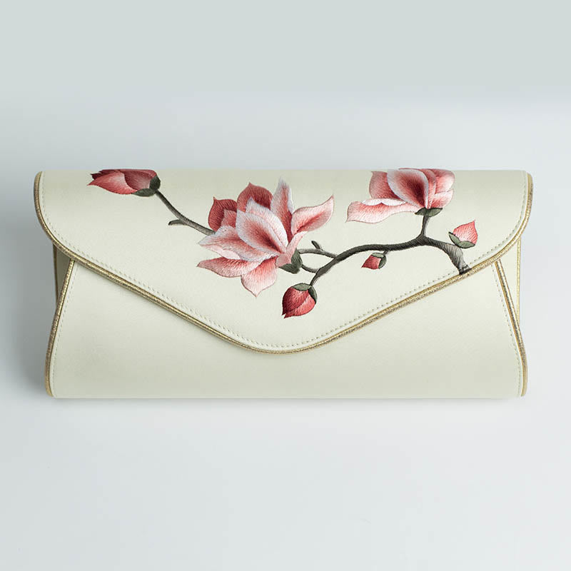 Bolso de mano con bordado de magnolia y Buddha Stones para bodas