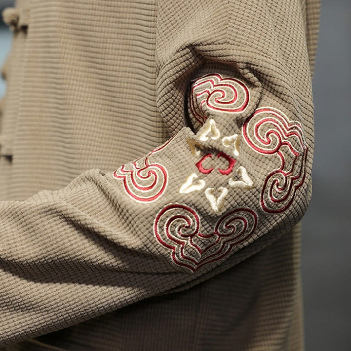 Traje de espiga con botones de rana para hombre de Buddha Stones , chaqueta larga de algodón pana bordada y bolsillos