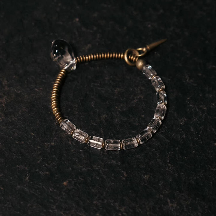 Pulsera de la suerte con cristales blancos y cobre y Buddha Stones
