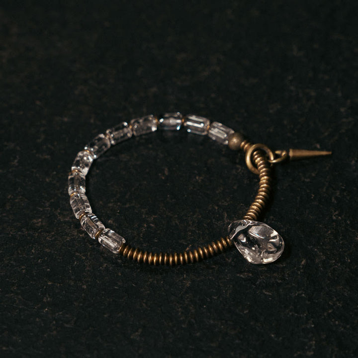 Pulsera de la suerte con cristales blancos y cobre y Buddha Stones