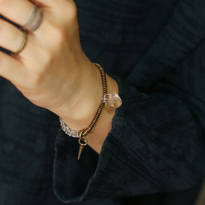 Pulsera de la suerte con cristales blancos y cobre y Buddha Stones