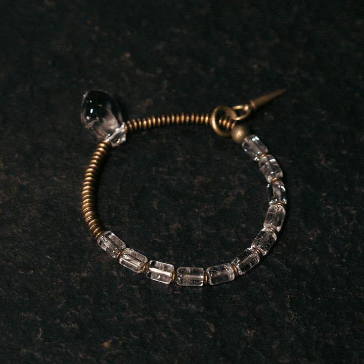 Pulsera de la suerte con cristales blancos y cobre y Buddha Stones