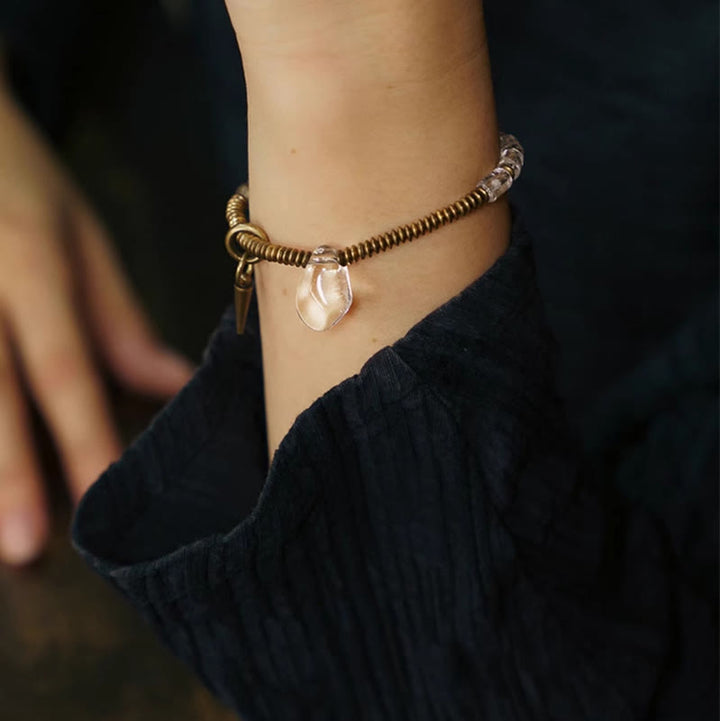 Pulsera de la suerte con cristales blancos y cobre y Buddha Stones