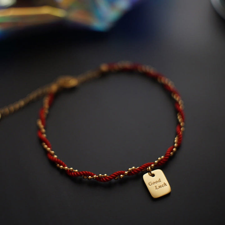 Pulsera de cobre bañada en oro con hilo rojo y Buddha Stones para la buena suerte y la fuerza