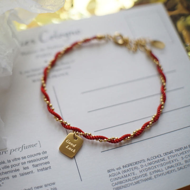Pulsera de cobre bañada en oro con hilo rojo y Buddha Stones para la buena suerte y la fuerza