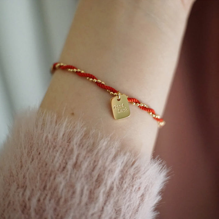 Pulsera de cobre bañada en oro con hilo rojo y Buddha Stones para la buena suerte y la fuerza