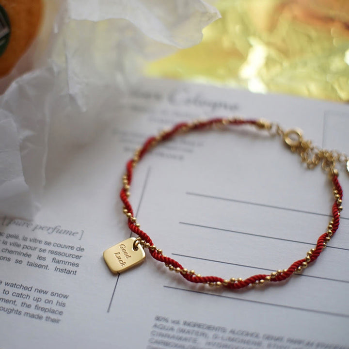 Pulsera de cobre bañada en oro con hilo rojo y Buddha Stones para la buena suerte y la fuerza