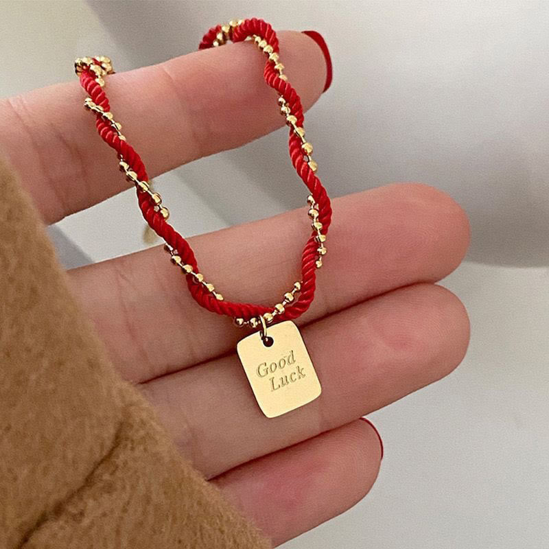 Pulsera de cobre bañada en oro con hilo rojo y Buddha Stones para la buena suerte y la fuerza