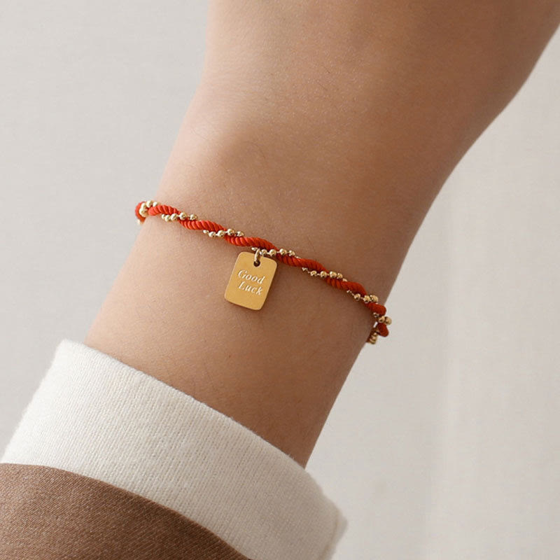 Pulsera de cobre bañada en oro con hilo rojo y Buddha Stones para la buena suerte y la fuerza