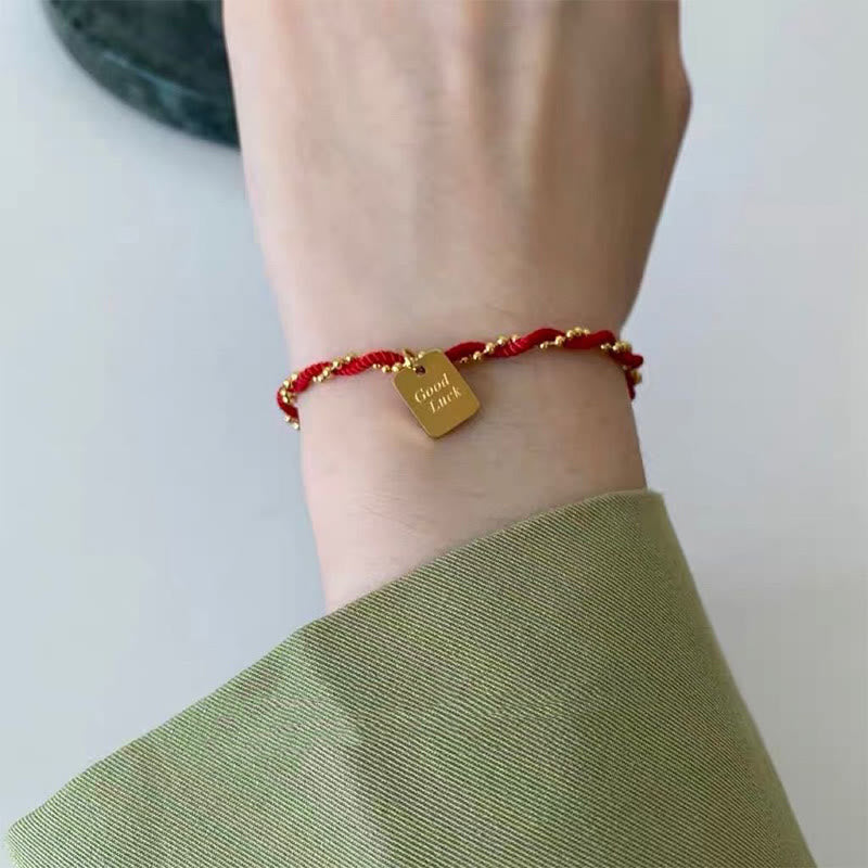 Pulsera de cobre bañada en oro con hilo rojo y Buddha Stones para la buena suerte y la fuerza