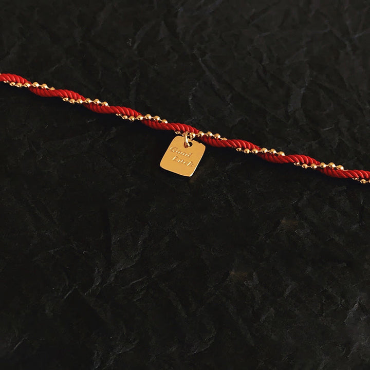 Pulsera de cobre bañada en oro con hilo rojo y Buddha Stones para la buena suerte y la fuerza