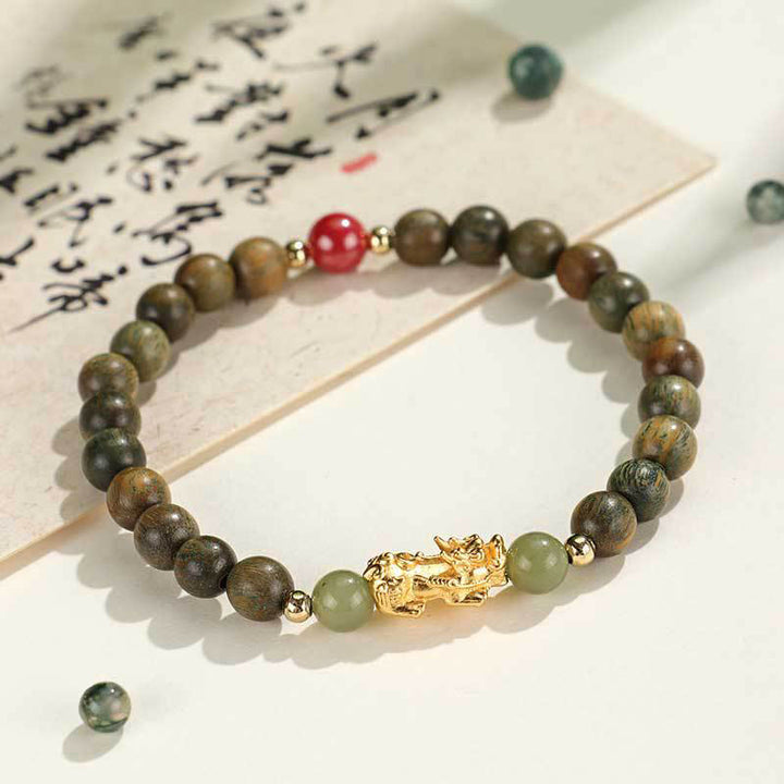Pulsera de la riqueza PiXiu con hojas pequeñas de sándalo, ébano, sándalo rojo, jade hetiano, cinabrio y Buddha Stones en plata de ley 999
