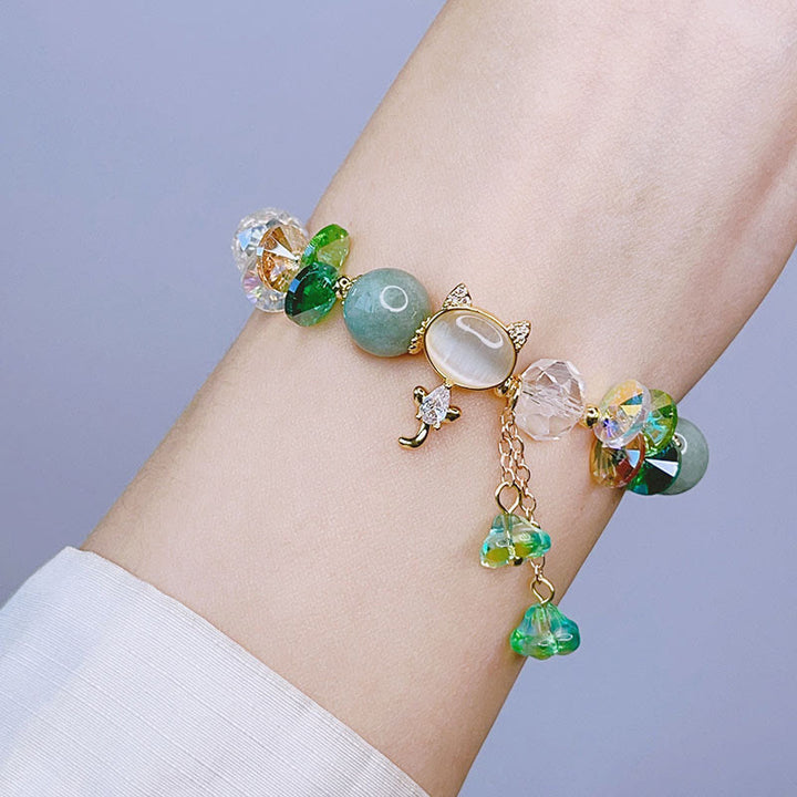 Pulsera de equilibrio de gato con cristales verdes, amatista y cristales rojos de Buddha Stones - image 9