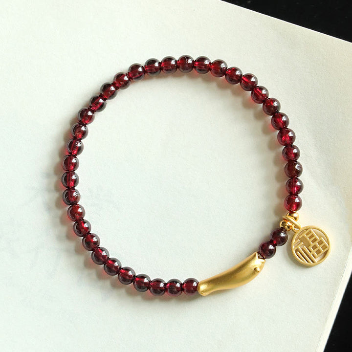 Pulsera de purificación con carácter de pez Fu en plata de ley 925 con Buddha Stones y granate