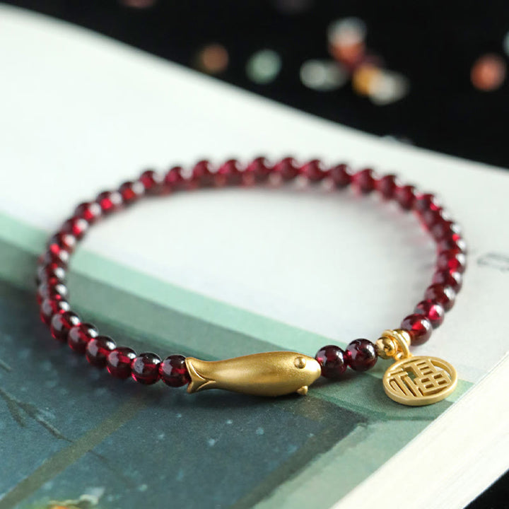 Pulsera de purificación con carácter de pez Fu en plata de ley 925 con Buddha Stones y granate