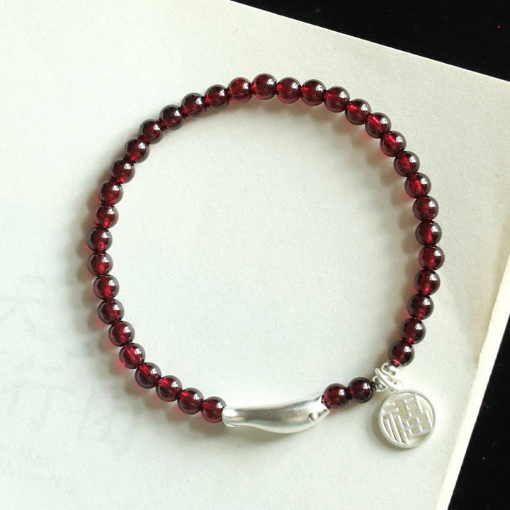 Pulsera de purificación con carácter de pez Fu en plata de ley 925 con Buddha Stones y granate