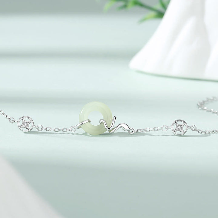 Pulsera de la suerte del año de la serpiente con hebilla de paz de jade hetiano y Buddha Stones en plata de ley 925